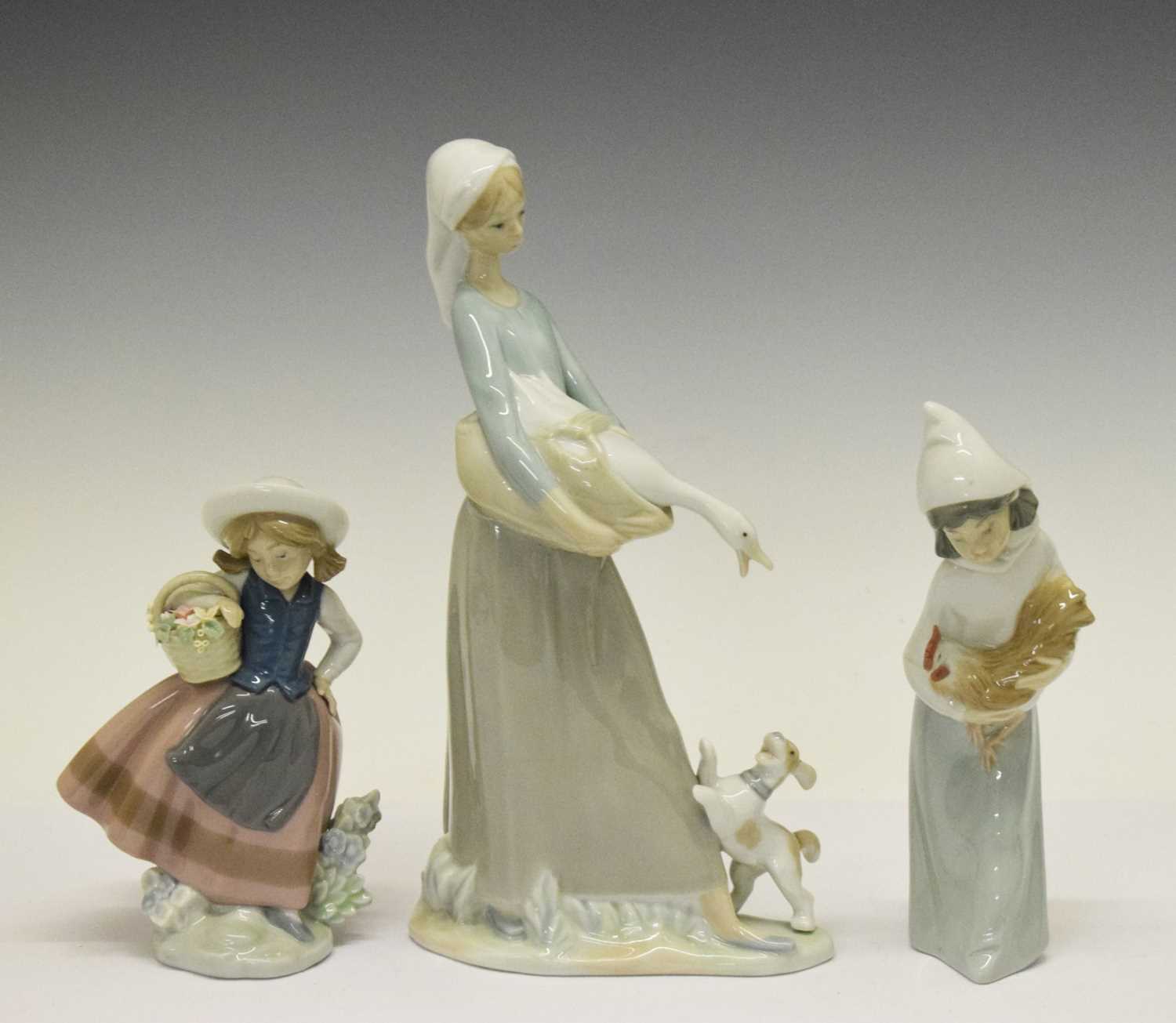 Two Lladro figures and a Nao figure