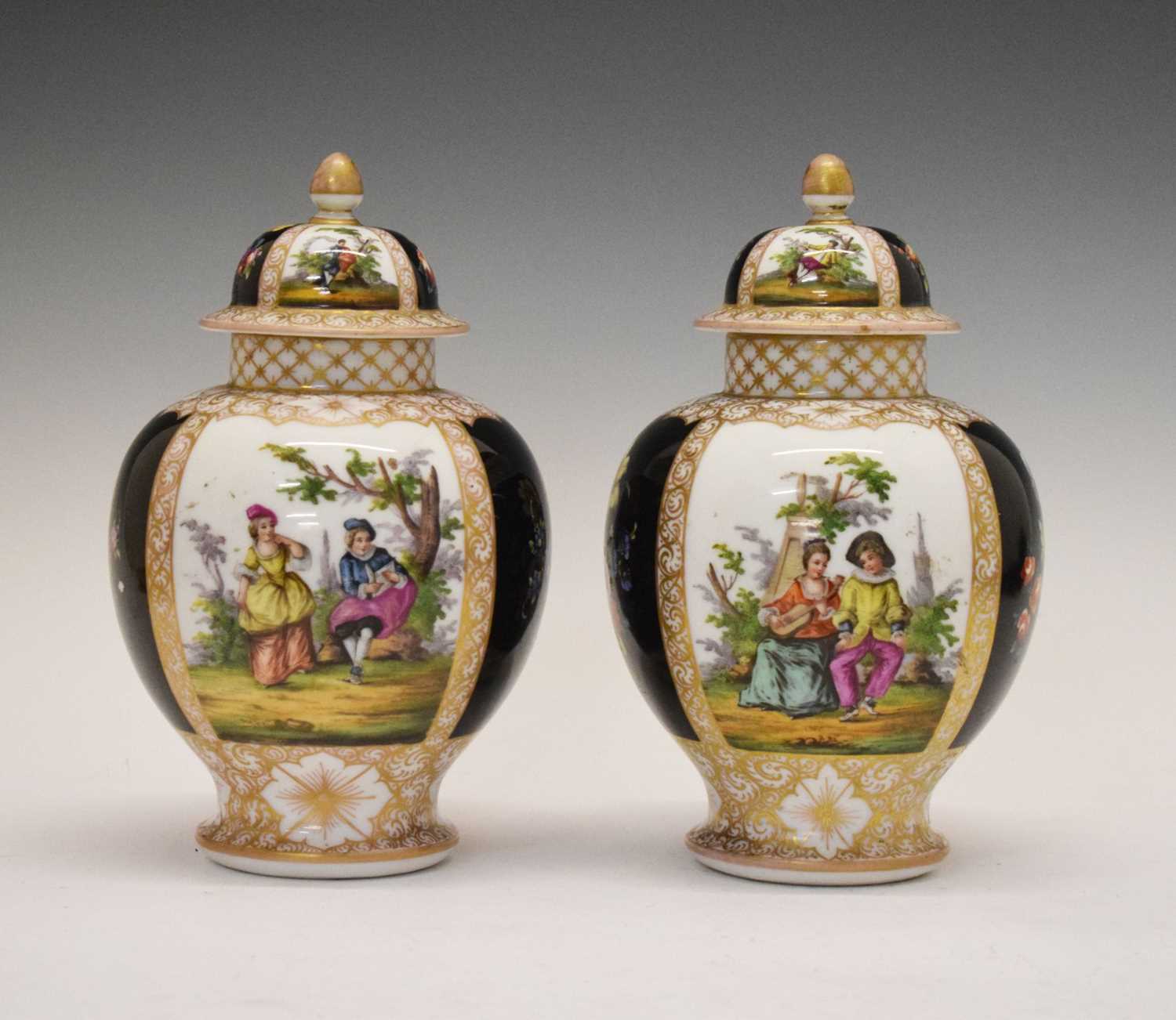 Pair of Dresden vases and covers