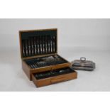 Art Deco oak-cased eight setting silver plated canteen and plated entrée dish