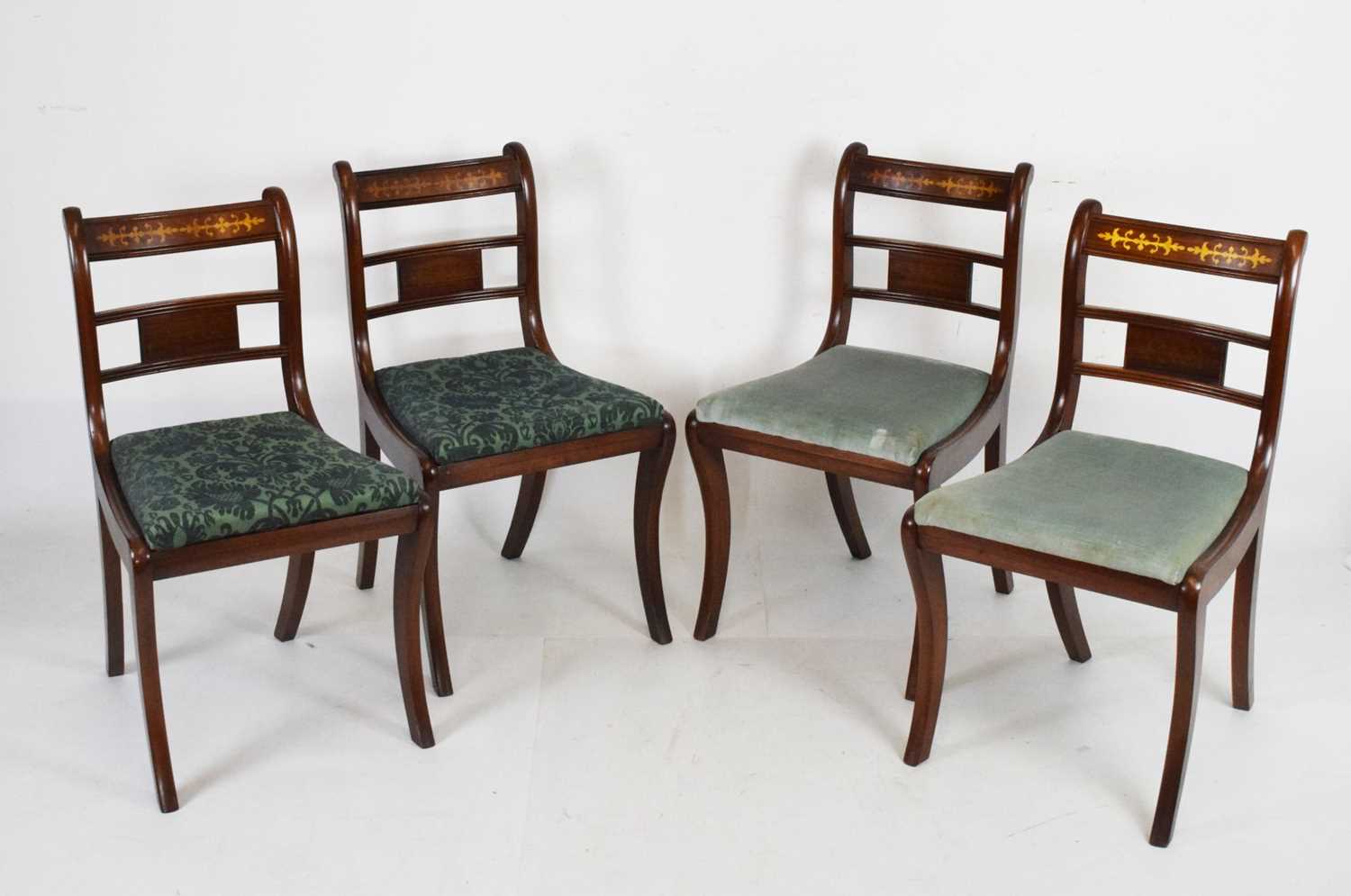 Set of four mahogany and brass inlaid chairs