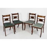 Set of four mahogany and brass inlaid chairs