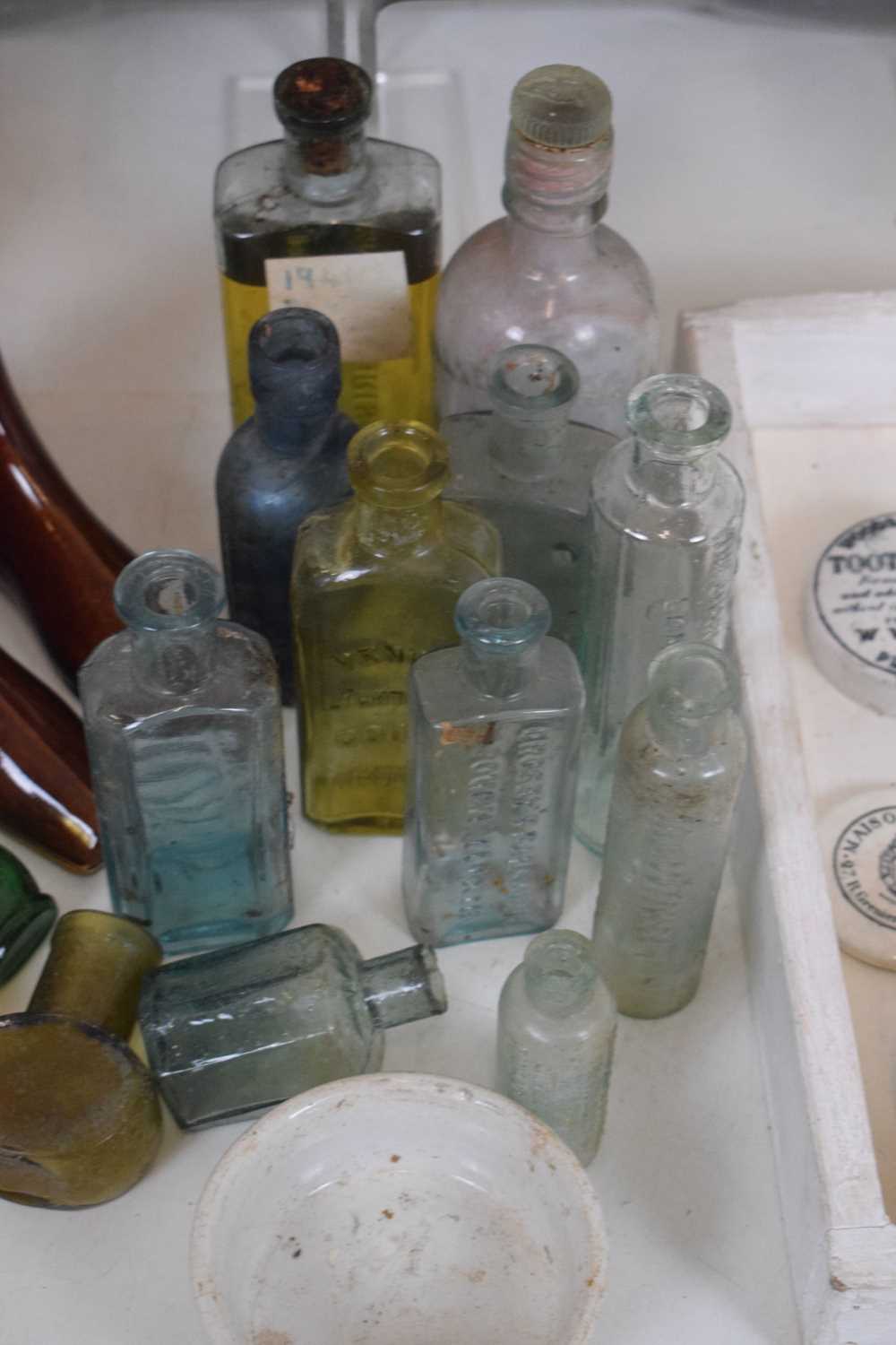 Collection of pot lids, advertising bottles, jelly mould, - Image 4 of 9