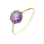 22ct gold ring set faceted purple stone