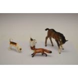 Beswick pony with two hounds and a fox