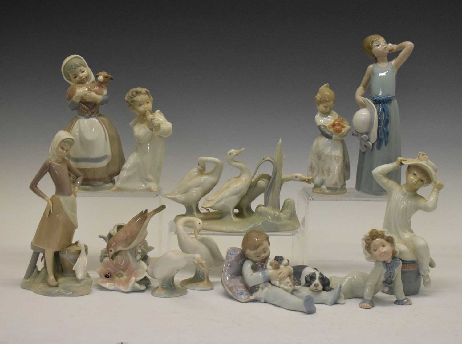 Lladro - Group of eleven porcelain figures/figure groups and Nao figure