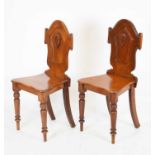 Pair of mahogany hall chairs