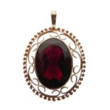 9ct gold pendant set large facetted red stone