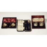 Three cased silver sets