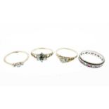 Four various gem-set dress rings