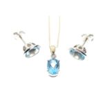 9ct gold, blue topaz and diamond pendant