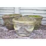 Three composite stone garden planters