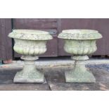 Pair of composite stone garden pedestal planters