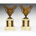 Pair of late 19th Century French gilt metal and onyx urns