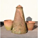 Two terracotta garden pots, together with a rhubarb forcer with cover