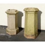 Two hexagonal composite stone chimney pots