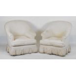 Pair of cream upholstered tub armchairs