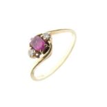 18ct gold, ruby and diamond three-stone ring