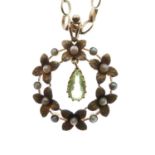 Edwardian yellow metal, seed pearl and peridot pendant with 9ct chain