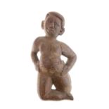 Unusual small Eastern wooden figure