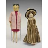 Two wooden peg dolls