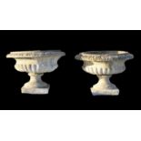 Pair of composite stone low pedestal planters