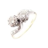 Diamond two-stone crossover ring