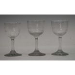 Two 19th Century English wine glasses and an 1892 'Peace and Plenty' engraved wine glass
