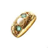 Unmarked yellow metal ring set emeralds and pearl