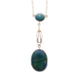 9ct yellow metal and black opal pendant with necklace