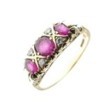 18ct gold, ruby, and diamond seven-stone ring