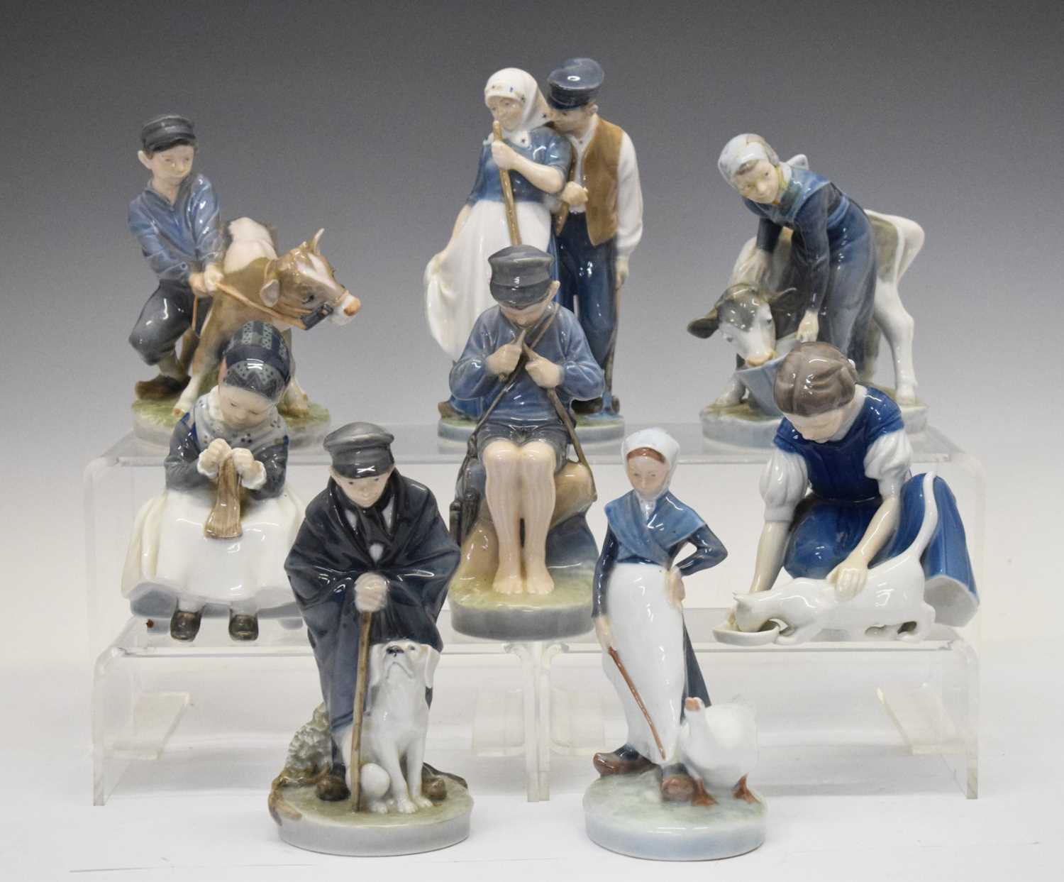 Collection of Royal Copenhagen porcelain figures and birds