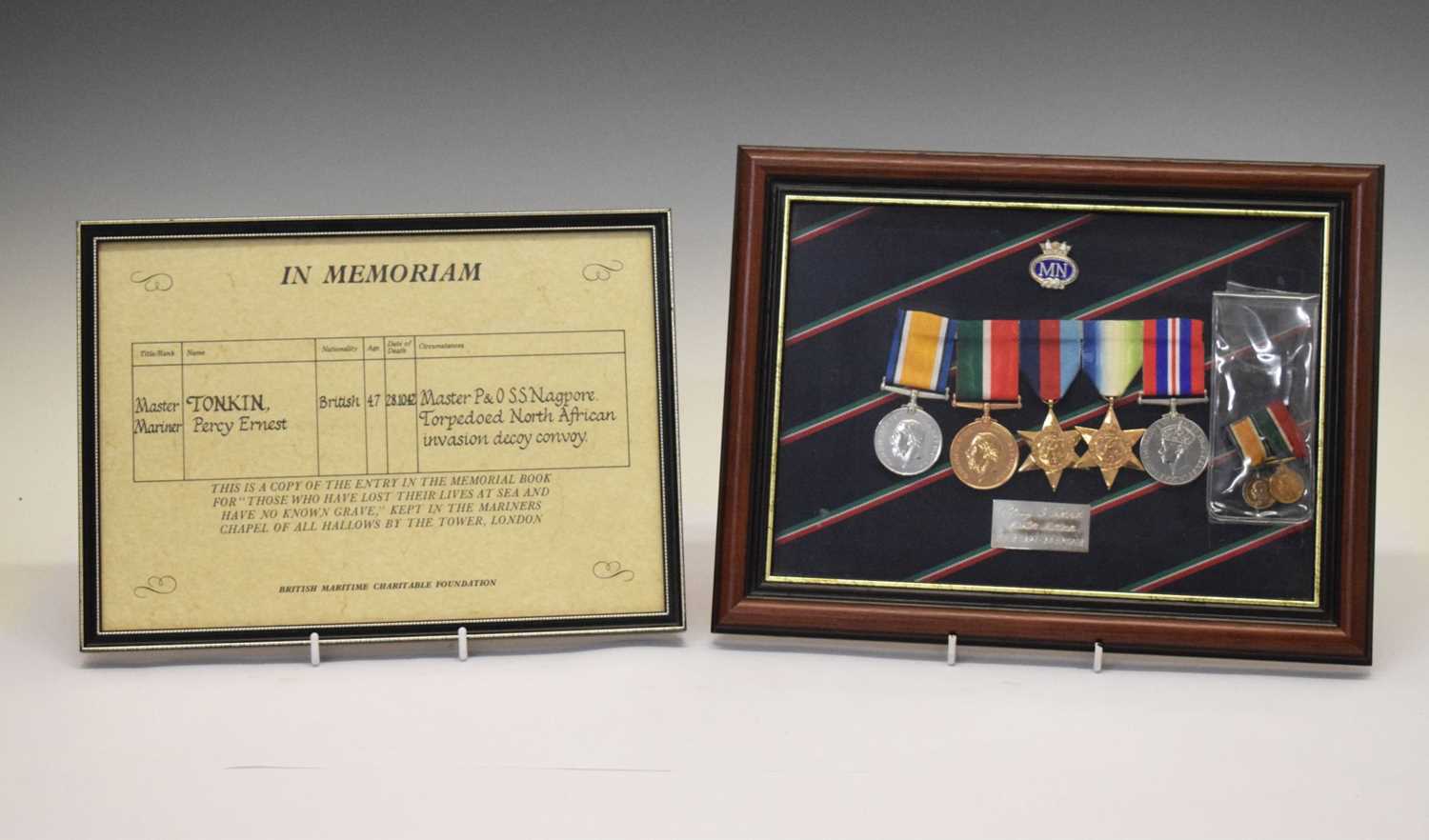 Framed British medal group awarded to Master Mariner Percy Ernest Tonkin