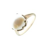 Yellow metal (9ct) ring set single pearl