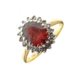 18ct gold cluster ring set diamonds and garnet-coloured stone