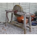 Antique stone grinding wheel