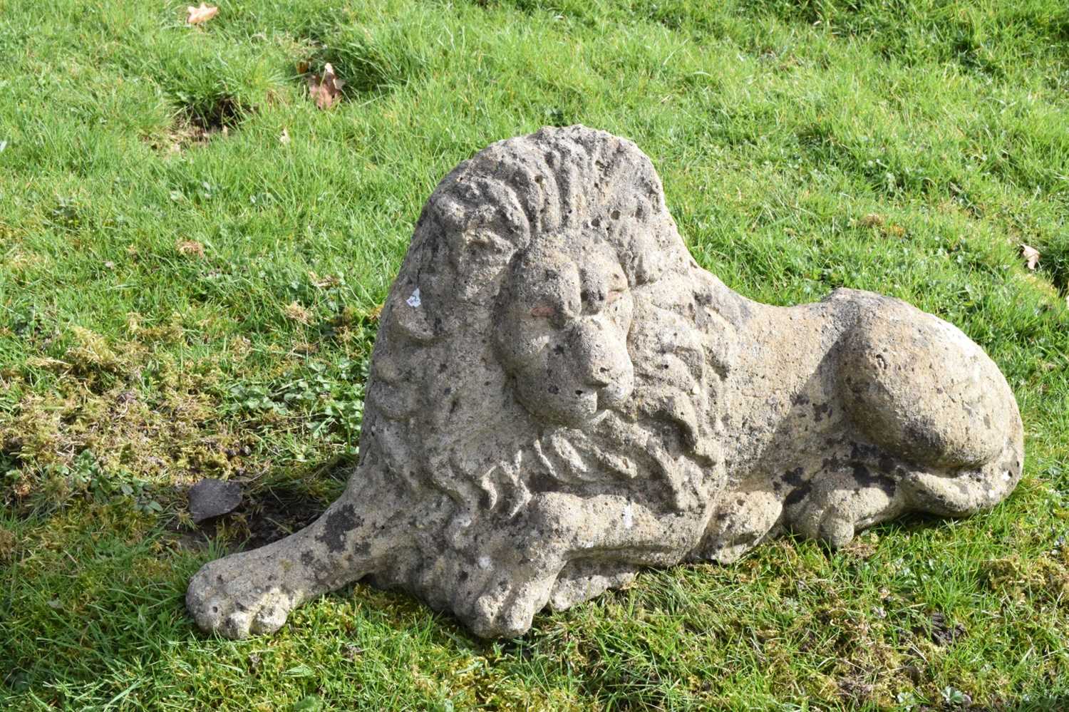 Pair of composite stone garden lions in recumbent posture - Image 2 of 11