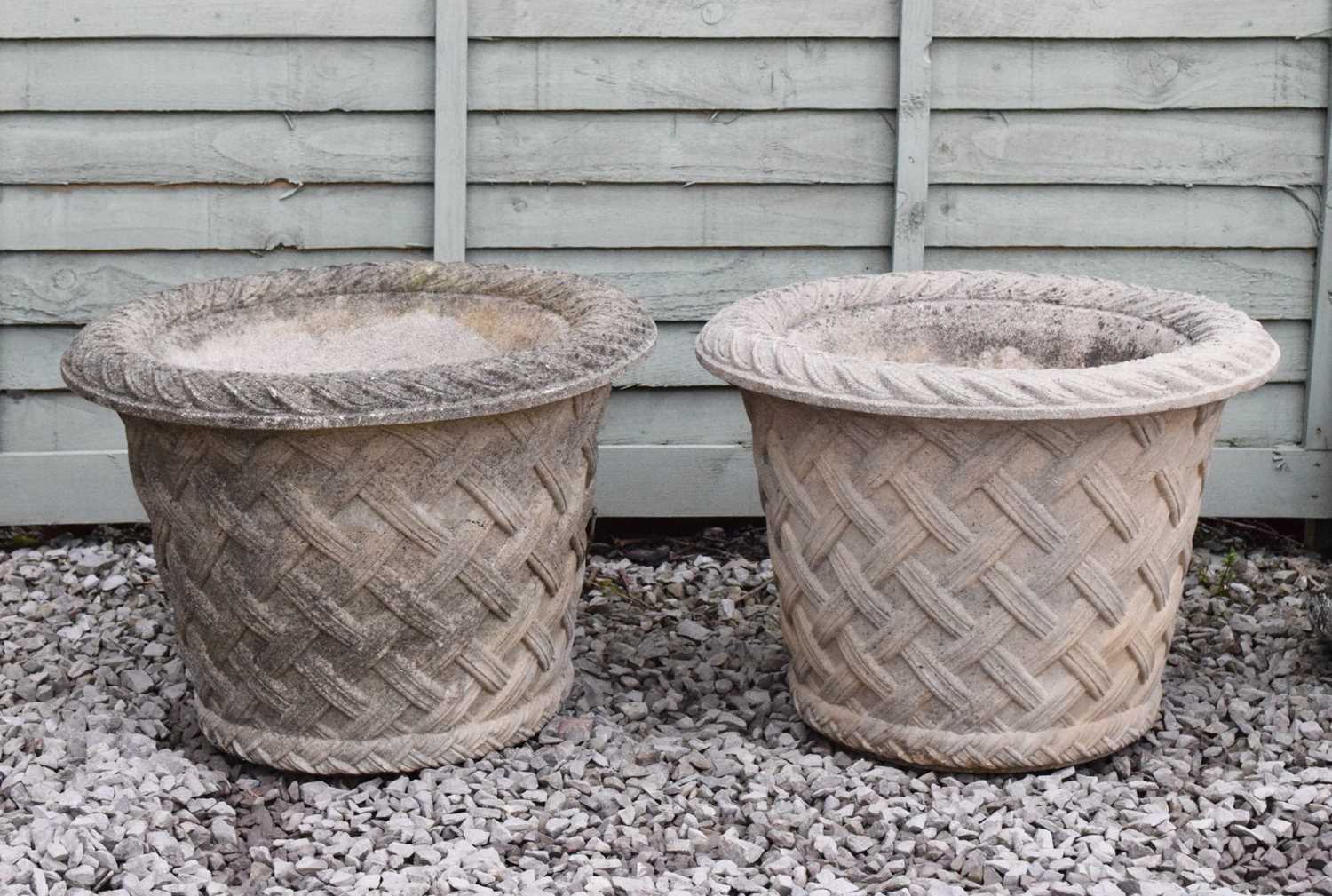 Pair of basket design garden urns