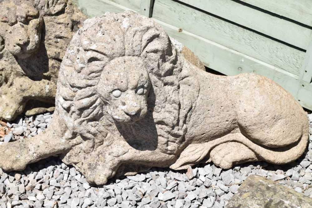 Pair of composite stone garden lions in recumbent posture - Image 6 of 11