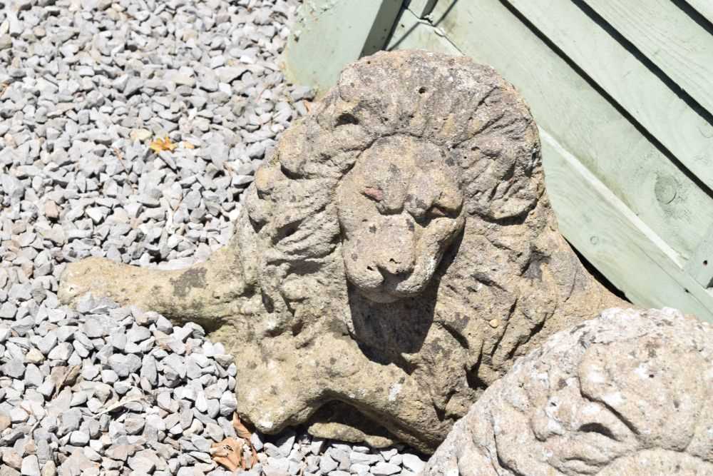 Pair of composite stone garden lions in recumbent posture - Image 7 of 11
