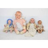 Four early 20th Century composition baby dolls
