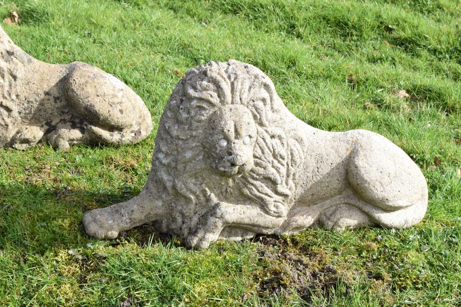 Pair of composite stone garden lions in recumbent posture - Image 11 of 11
