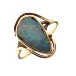 Unmarked yellow metal ring set boulder opal