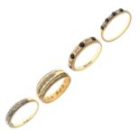 Four various gold stone set rings