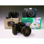 Three boxed Fujifilm cameras