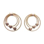 Pair of bi-colour hoop earrings with heart motifs