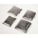 Four early 20th Century silver cigarette cases