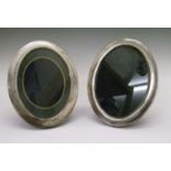 Pair of silver oval photograph frames