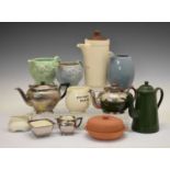 Silver lustre pottery three piece tea set, and a quantity of jugs