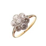 Seven-stone diamond daisy cluster ring