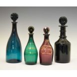 Four 19th Century coloured glass decanters